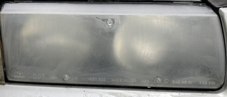 A shot of my headlight after the second round of sanding; many of the large scratches from the first round have been removed