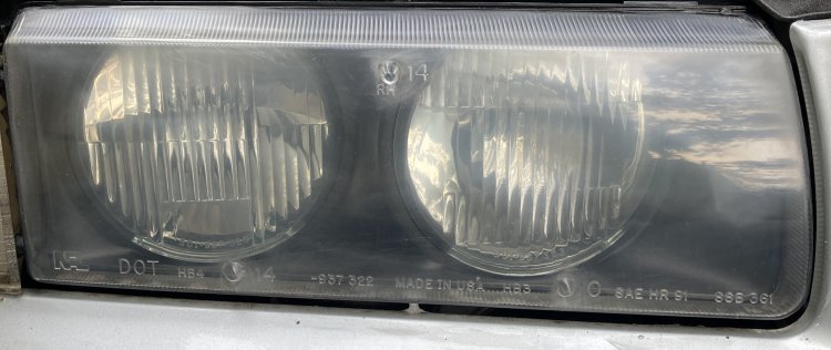 A shot of my headlight after wet-sanding; the housing is hazier than before restoration began but is no longer yellowed