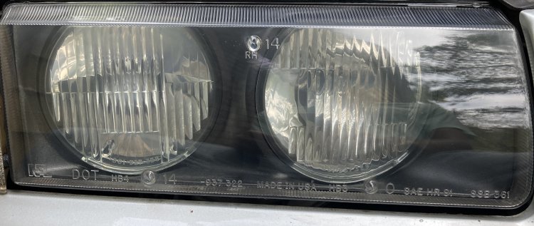 A shot of my headlight after applying protectant; the reflections are much sharper compared to buffing alone